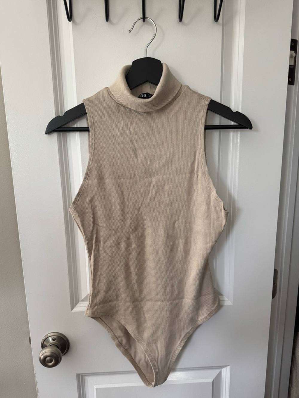 Zara Sleeveless Turtleneck Bodysuit in Beige